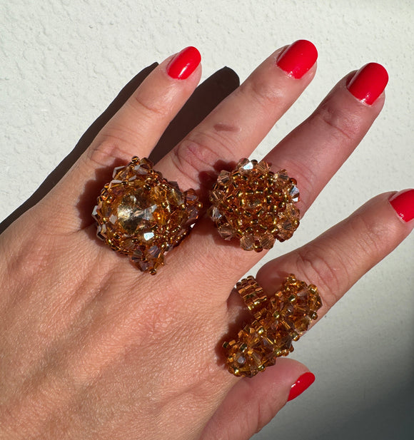 Three handmade beaded rings with diferents styles. Brown color.